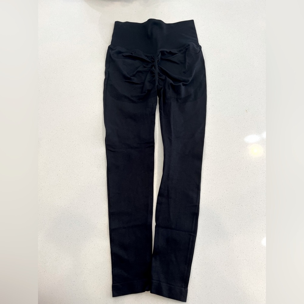 Booty enhancing leggings, size small.